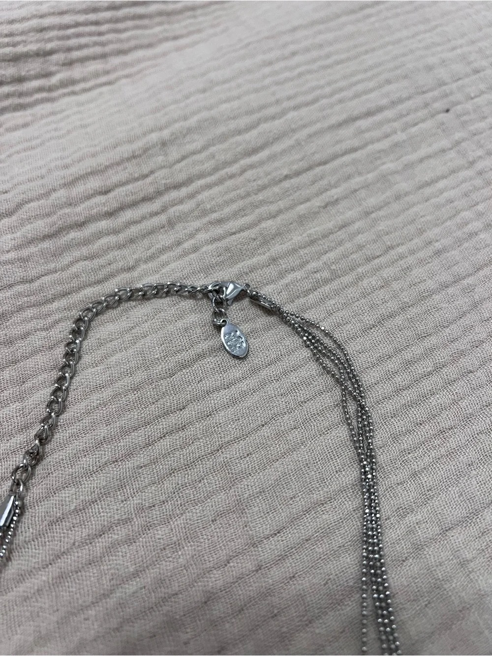 Silver tone 80R necklace